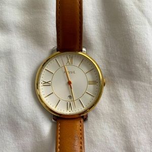 Woman’s Gold Fossil Watch
